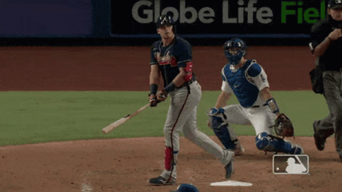 A Baseball Game Is Being Played In Front Of An Ad For Globe Life GIF