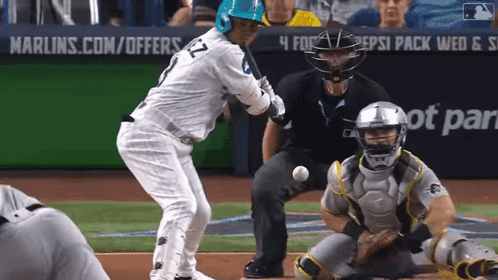 A Baseball Game Is Being Played In Front Of An Ad For Pepsi Pack GIF