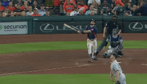 A Baseball Game Is Being Played In Front Of An Advertisement For Lexus GIF