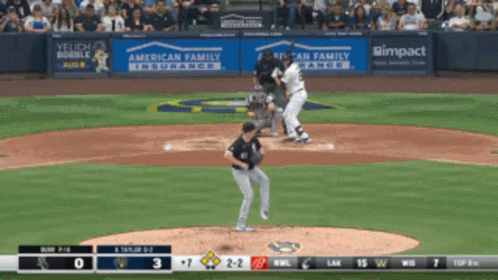 A Baseball Game Is Being Played In Front Of An American Family Insurance Sign GIF