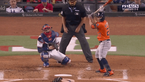 A Baseball Game Is Being Played With A Globe Life Field Logo In The Background GIF
