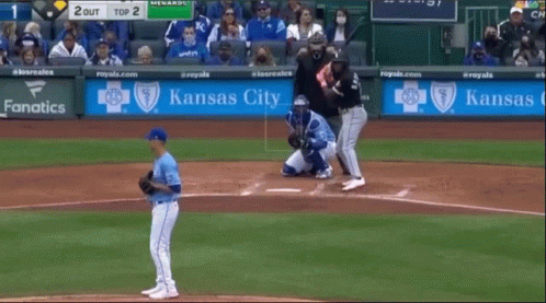 A Baseball Game Is Being Played With A Kansas City Banner In The Outfield GIF