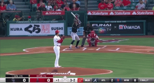 A Baseball Game Is Being Played With Advertisements For Kura Sushi Funai And Yamada On The Outfield Wall GIF