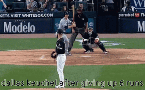 A Baseball Game Is Being Played With Advertisements For Modelo Beer In The Background GIF