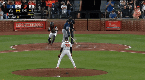 A Baseball Game Is Being Played With An Ad For Kids Cheer Free In The Background GIF