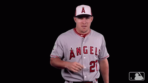 A Baseball Player For The Angels Poses For A Picture GIF
