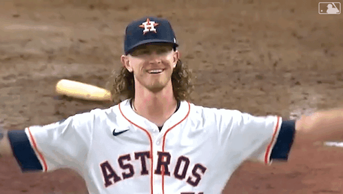 A Baseball Player For The Astros Is Standing On The Field GIF