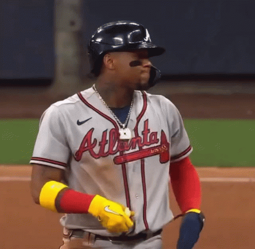 A Baseball Player For The Atlanta Braves Is Wearing A Helmet GIF