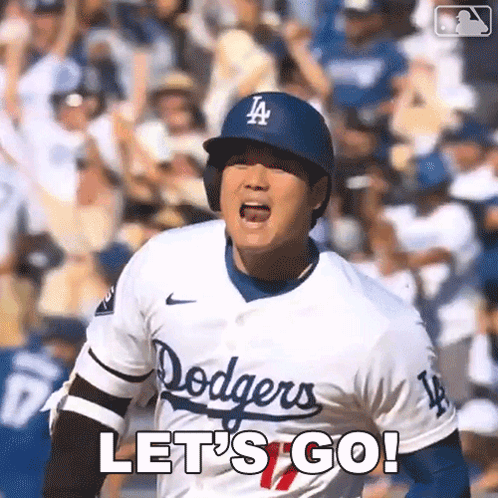 A Baseball Player For The Dodgers Is Shouting Let 'S Go . GIF
