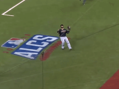 A Baseball Player For The Indians Is Kneeling Down GIF