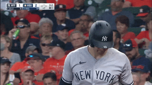 A Baseball Player For The New York Yankees Is Looking Down GIF