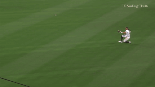 A Baseball Player For The Padres Runs On A Field GIF