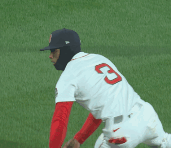 A Baseball Player For The Red Sox Wearing A Mask And Glove GIF