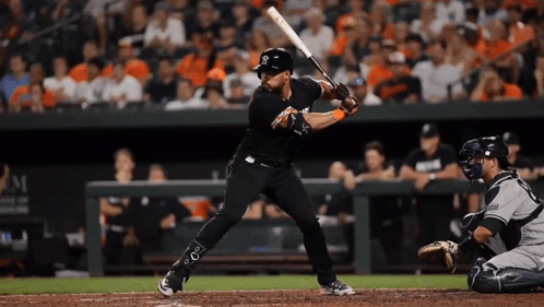 A Baseball Player Getting Ready To Hit A Ball With The Letter S On His Shirt GIF