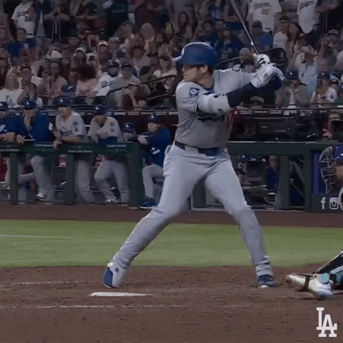 A Baseball Player Getting Ready To Swing At A Pitch With The La Logo In The Corner GIF