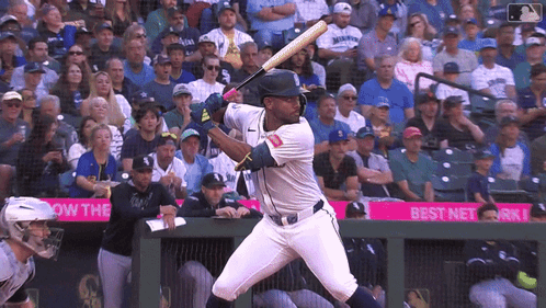 A Baseball Player Getting Ready To Swing His Bat In Front Of A Crowd That Is Watching GIF