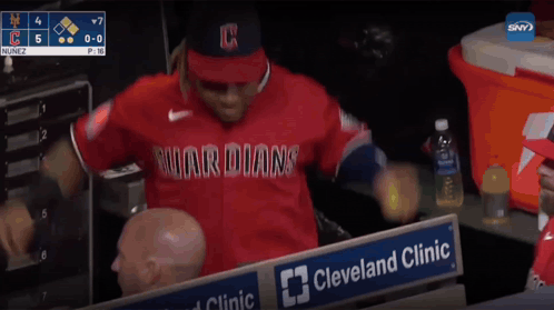 A Baseball Player In A Red Guardians Jersey GIF