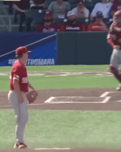 A Baseball Player In A Red Uniform With The Number 59 On The Back GIF
