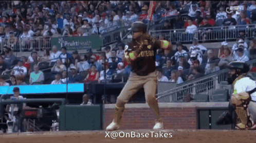 A Baseball Player In A San Diego Padres Jersey Stands On The Field GIF