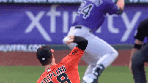 A Baseball Player In An Orange Jersey With The Number 8 On The Back GIF