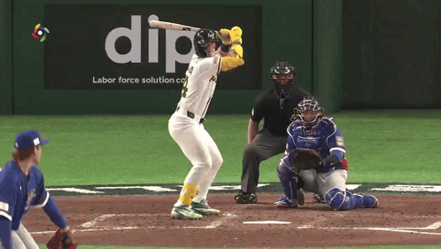 A Baseball Player Is At Bat In Front Of An Ad For Dip Labor Force Solution GIF