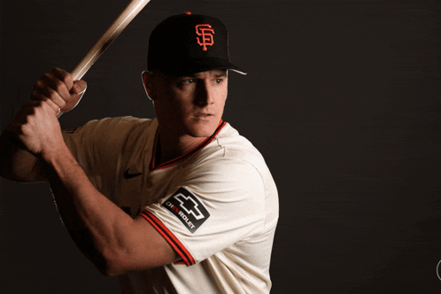 A Baseball Player Is Holding A Bat And The Name Matt Cayman Is Visible GIF