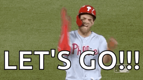 A Baseball Player Is Holding His Arms In The Air And Says `` Let 'S Go ! '' GIF