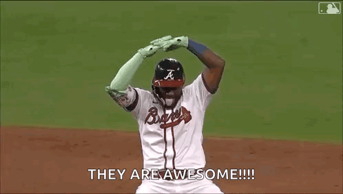 A Baseball Player Is Kneeling On The Field And Saying `` They Are Awesome ! '' GIF