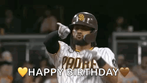 A Baseball Player Is Pointing At The Camera While Wearing A Helmet And Gloves And Says `` Happy Birthday '' . GIF