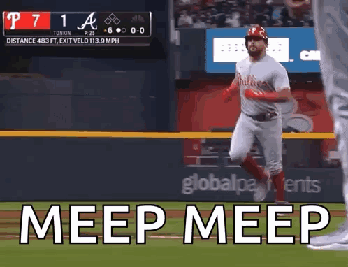 A Baseball Player Is Running On The Field With The Words Meep Meep Written On The Screen Behind Him . GIF