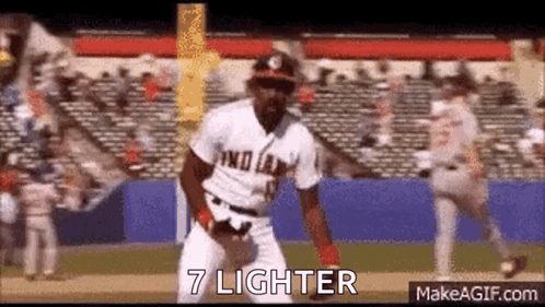 A Baseball Player Is Standing On A Field With The Words `` 7 Lighter '' Above Him . GIF