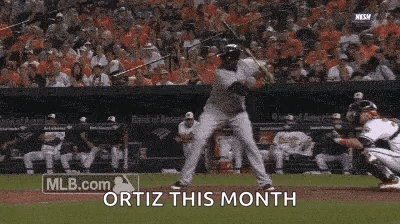 a baseball player is swinging a bat at a ball and the words ortiz this month are above him