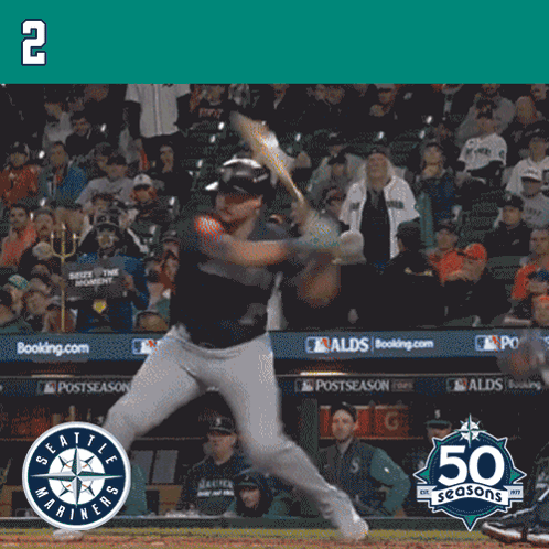 A Baseball Player Is Swinging A Bat In Front Of A Crowd With The Number 2 On The Bottom GIF