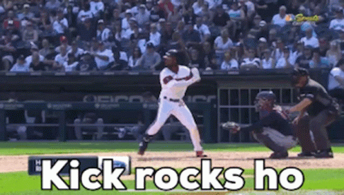 a baseball player is swinging at a ball with the words kick rocks ho below him