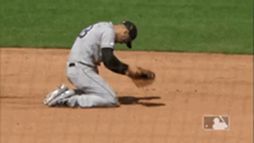 A Baseball Player Kneeling On The Field With A Mlb Logo In The Corner GIF