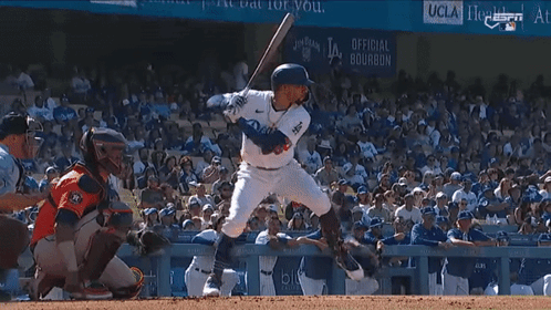 A Baseball Player Named Betts Swings His Bat At A Pitch GIF