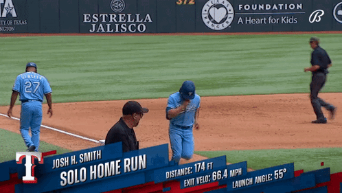 A Baseball Player Named Josh H. Smith Is Running To First Base GIF