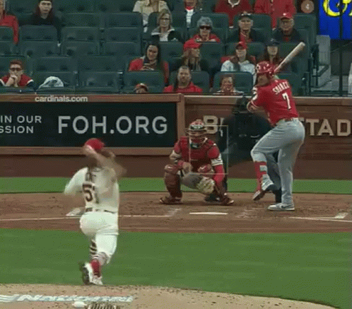 A Baseball Player Named Smith Is Swinging His Bat At A Pitch GIF
