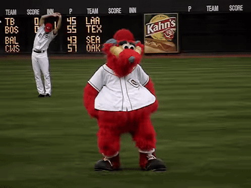 A Baseball Player Stretches His Arms In Front Of A Kahn 'S Sign GIF