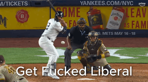 A Baseball Player Swings At A Ball In Front Of A Jim Beam Ad GIF