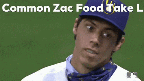 A Baseball Player Wearing A Bandana Around His Neck And A Blue Hat With The Words Common Zac Food Take L On It . GIF