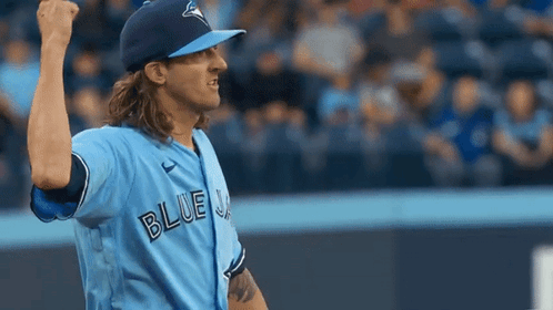 A Baseball Player Wearing A Blue Jays Jersey GIF