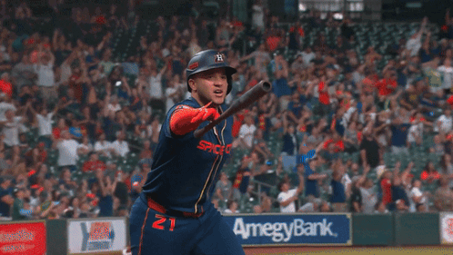 A Baseball Player Wearing A Blue Jersey That Says Space GIF