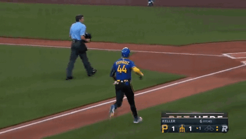 A Baseball Player Wearing A Blue Jersey With The Number 44 On It GIF