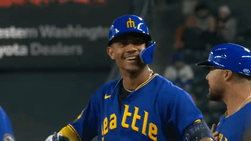 A Baseball Player Wearing A Blue Shirt With The Word Little On It GIF