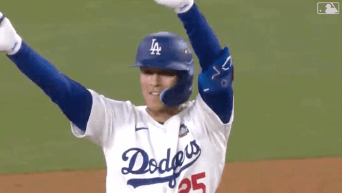 A Baseball Player Wearing A Dodgers Jersey Celebrates GIF