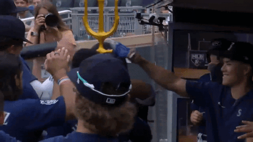 A Baseball Player Wearing A Hat That Says Mlb GIF