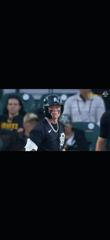 A Baseball Player Wearing A Helmet And A Jersey With The Letter D On It GIF