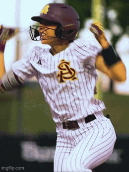 a baseball player wearing a helmet and a jersey with the letter s on it
