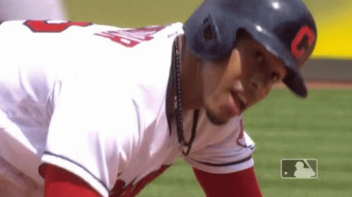 A Baseball Player Wearing A Helmet With The Letter O On The Front GIF